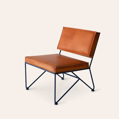 Upholstered Lounge Chair in Natural Leather with Sapphire Blue Base